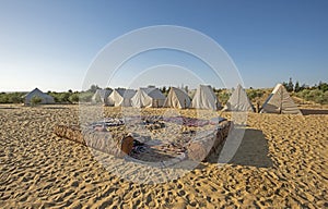 Desert landscape campsite in hot climate with tents