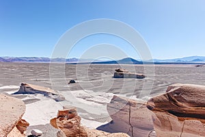 desert landscape featuring large white rock formations at Campo de Piedra Pomez photo