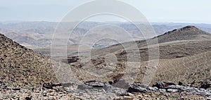 Desert landscape on hazy day photo