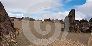Desert landscape panorama with rocks, blue sky