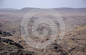 Desert landscapes in Morocco. Climate change and arid climate. Mountains and hills