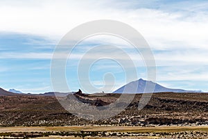 Desert landscapes with mountains in Bolivia at the dry season, dry vegetation is a natural background