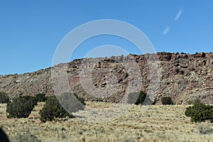 Desert Mountain With a Bushes in the Foreground Along the Highway on a Bright, Clear Late Fall Day