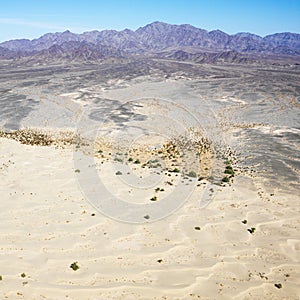 Desert and mountain range.
