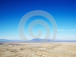 Desert and mountain range.