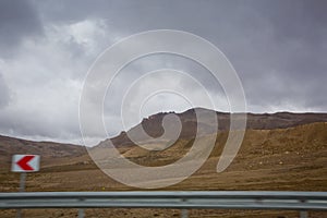 Desert-mountainous terrain . Blue sky with many white clouds. Desert and Mountain Landscape with Azerbaijan . Desert and blue sky