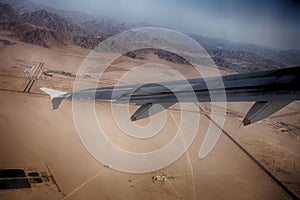 Desert mountains view from airplane