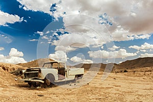 Desert Relic. Old Car rusting away in the desert