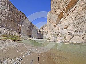 Desert River Entering a Remote Canyon