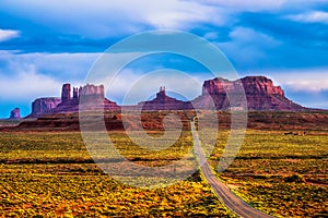 Desert road leading to Monument Valley in Navajo Nation Reservation
