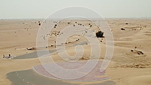 Desert road with sand dunes