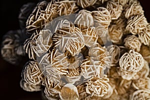 Desert Rose Selenite rock closeup with black background