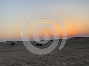 Desert safari on sunset in Dubai.