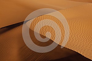 Desert sand dune with shadow