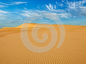 Desert sand dunes on sunrise