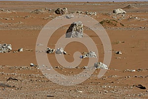 Desert sand in the heart of Saudi Arabia, rocks are also seen