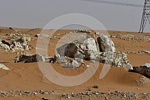 Desert sand and rocks, in the heart of Saudi Arabia, rocks are also seen