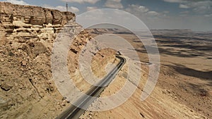 desert sands of the blue sky, white clouds, the camera flies over the land, the landscape in Israel