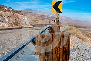 Desert scenic road in Death Valley with mountain backdrop, California, USA. Amazing natural panorama