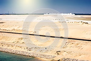 desert ship -freightship traverses the Suez Canal in the direction of the Red Sea