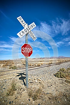 Desert Stop Sign and Railroad Crossing