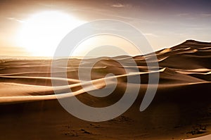 Desert sunrise. Large sand dunes of Erg Chebbi in Morocco