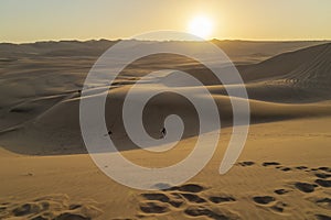 Desert during sunset at Huacachina Oasis in Ica, Peru