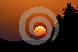 DESERT sunset with a red sky