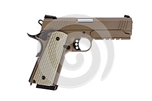 Desert tactical pistol on white background photo