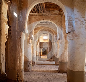 Desert town of Mhamid, Morocco village with sand dunes and old muslim mosque in north Africa, old narrow streets, traditional clay