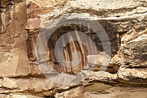 Desert Varnish streaking on a sandstone cliff in Sego Canyon, Utah