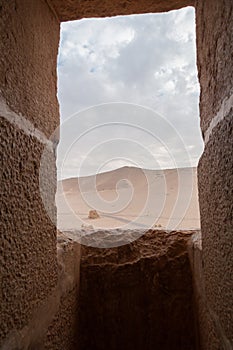 Desert view via a fortress window in Palmyra, Syria