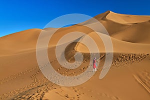 The desert wave and girl sunset in Tulufan city