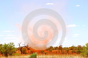 Desert whirlwind dust storm heat waves, Outback Uluru, Australia photo