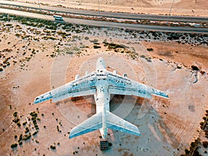 Deserted airplane in the in the Umm Al Quwain desert in the emirate of the United Arab Emirates