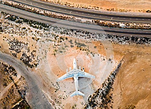 Deserted airplane in the in the Umm Al Quwain desert in the emirate of the United Arab Emirates