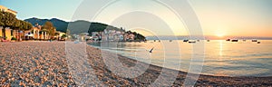 Deserted beach Moscenicka Draga, seascape in the morning mood with rising sun photo
