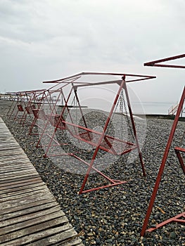 Deserted beach. Prohibition. Epidemic. Quarantine. Deserted place. Sea. Swing.