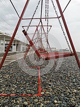 Deserted beach. Prohibition. Epidemic. Quarantine. Deserted place. Sea. Swing.