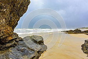 Deserted beach on a rainy day