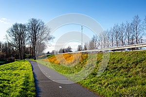 A deserted bikepath along the A44 highway in Sassenheim photo