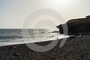 A deserted black sand beach popular with vacationers near the village of Ajuy on the Atlantic coast.