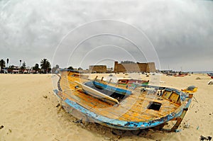 Deserted boat on a beach