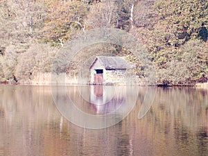 Deserted boathouse by the lake