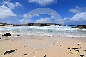 Deserted Boca Ketu Beach with a Rock Formation