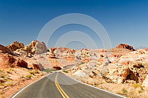 Deserted desert highway photo