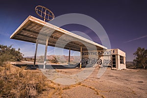 Deserted gas station on the border of Arizona and California, photo