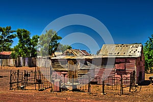 Deserted goldminers’ cabin made of corrugated iron in the Australian outback