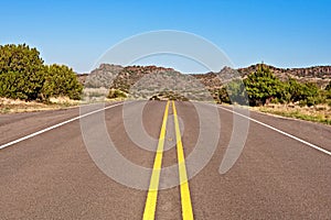 Deserted highway in desert.