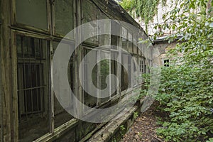 Deserted house with broken windows